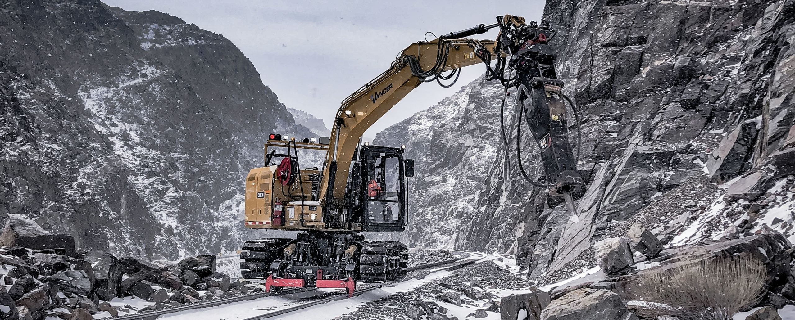 railroad excavator in mountains