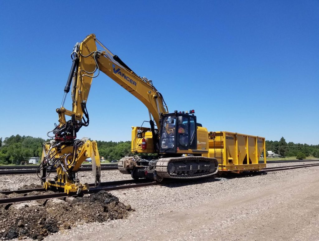 Ballast Cribber Hi-Rail Excavator Attachment